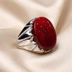 Deep red Yemeni agate cabochon set in a handmade sterling silver ring